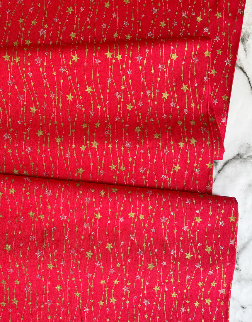 Red String of Glitter Stars Metallic Christmas Fabric
