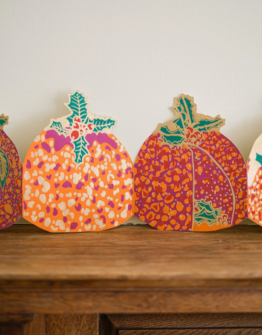 Christmas Puddings Concertina Paper Garland, East End Press